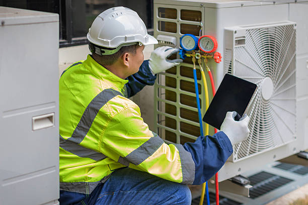 Professional Hvac technician working in De Armanville, AL